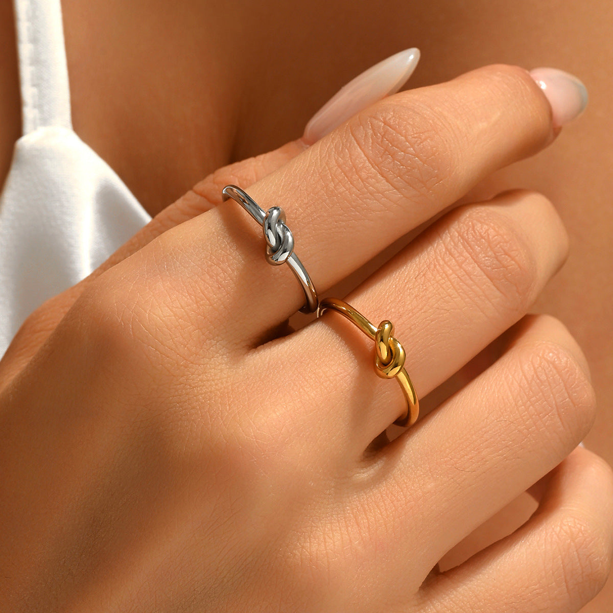 Stainless Steel Ring With A Braided Cord And Adjustable Opening